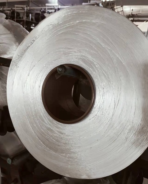 วิธีที่เส้นด้าย FDY ช่วยเพิ่มความแข็งแรงและความนุ่มนวลของผ้า: การเจาะลึกสิ่งทอ